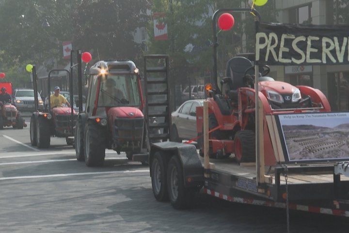 Tractor rally rolls through Penticton in protest of proposed development