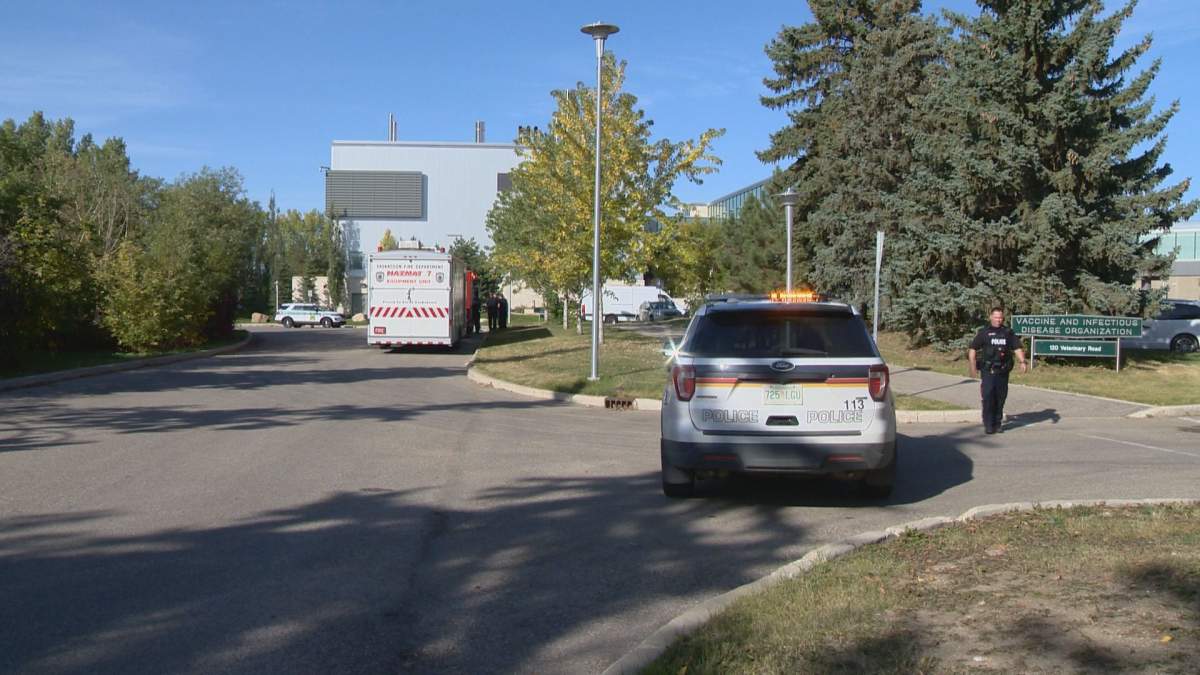 A Saskatoon Fire Department hazmat team and police car parked outside the VIDO-InterVac labs on Tuesday.