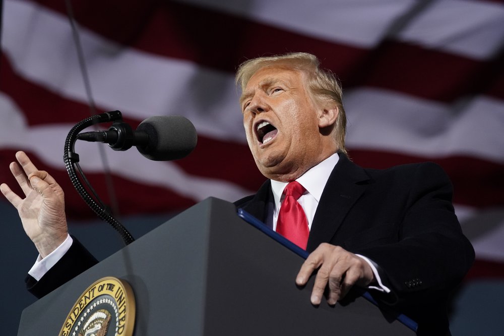 President Donald Trump speaks at a campaign rally at Des Moines International Airport, Wednesday, Oct. 14, 2020, in Des Moines, Iowa. (AP Photo/Alex Brandon).