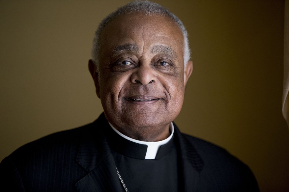 FILE - This Sunday, June 2, 2019, file photo shows Washington D.C. Archbishop Wilton Gregory posed for a portrait following mass at St. Augustine Church in Washington. Pope Francis has named 13 new cardinals, including Washington D.C. Archbishop Wilton Gregory, who would become the first Black U.S. prelate to earn the coveted red cap. In a surprise announcement from his studio window to faithful standing below in St. Peter’s Square, Sunday, Oct. 25, 2020, Francis said the churchmen would be elevated to a cardinal’s rank in a ceremony on Nov. 28. 