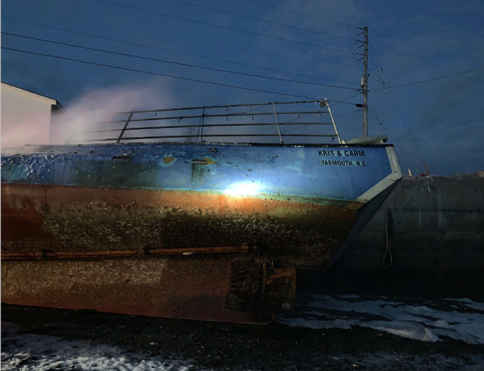 RCMP are investigating after a suspicious fire destroyed this boat, the Kris & Carm, in Comeauville, N.S.