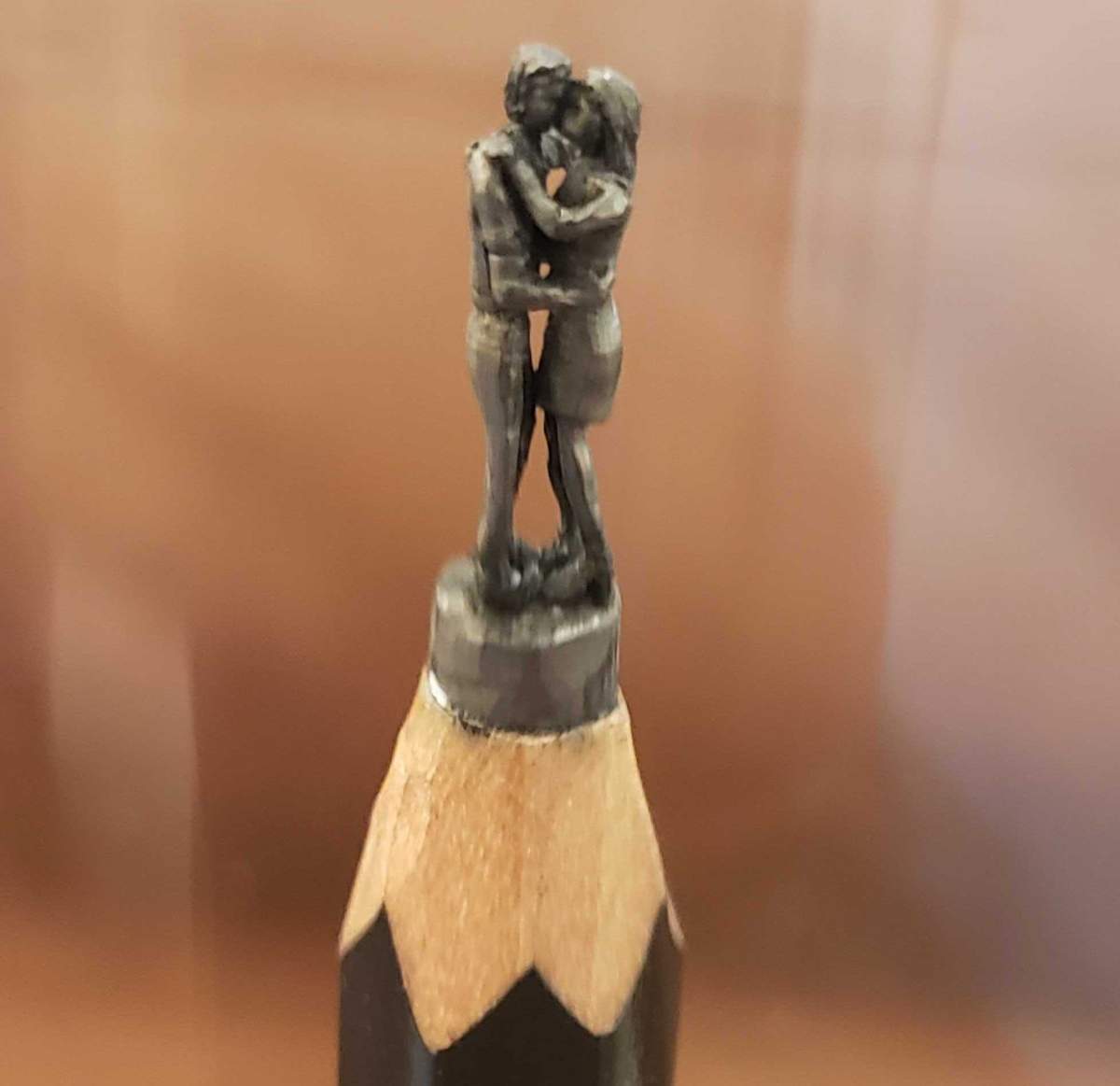 Artist Thomas Jacob sculpts micro-miniature people out of pencil leads.