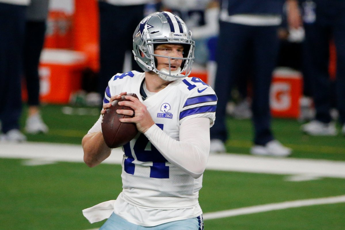Dallas Cowboys quarterback Andy Dalton (14) drops back to pass in the second half of an NFL football game against the New York Giants in Arlington, Texas, Sunday, Oct. 11, 2020.