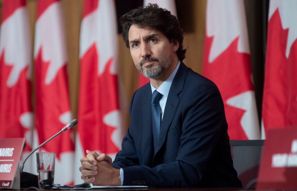 Prime Minister Justin Trudeau listens to a question during a news conference Friday October 9, 2020 in Ottawa.