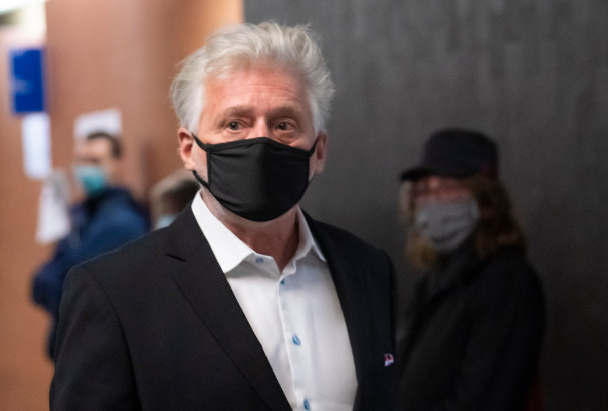 Just for Laughs founder Gilbert Rozon walks the hall of the courthouse as he arrives for the beginning of his sexual assault trial in Montreal on Tuesday, October 13, 2020. The verdict in the case is scheduled for Dec. 15.