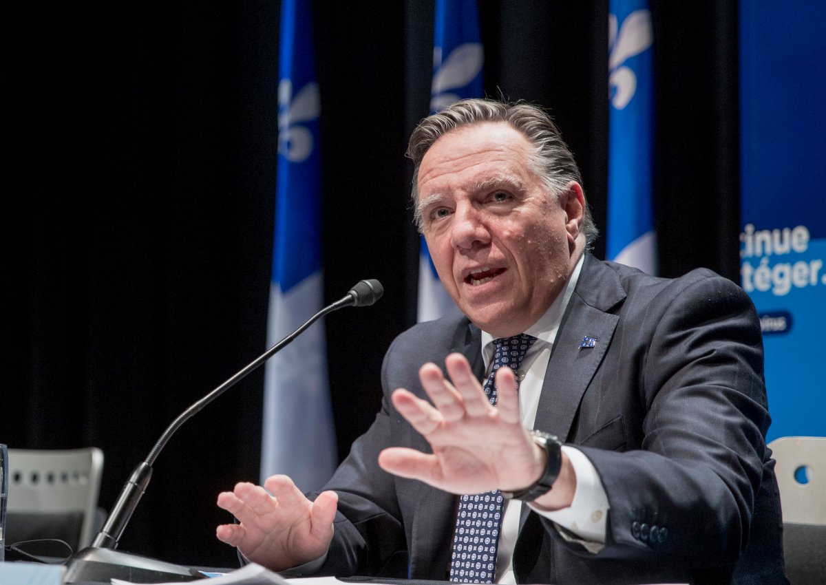 Quebec Premier Francois Legault responds to a question during a news conference in Montreal, Thursday, Oct. 15, 2020. Legault has the economy on his mind as he awaits American elections results. Thursday, Nov. 5, 2020.