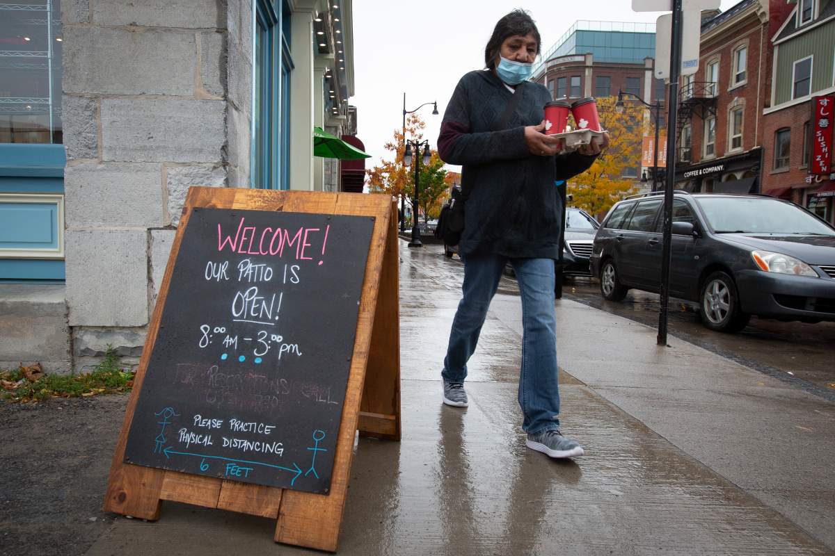 A person wears a mask in Kingston, Ontario on Monday, October 19, 2020. 