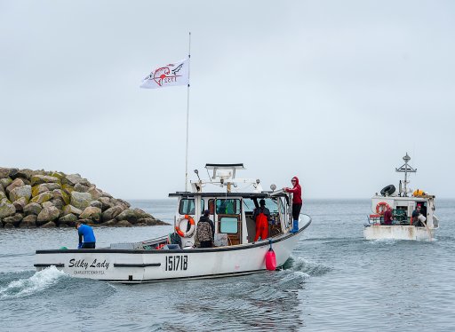 Indigenous lobster boats head from the harbour in Saulnierville, N.S. on Wednesday, Oct. 21, 2020. Tensions remain high over an Indigenous-led lobster fishery that has been the source of conflict with non-Indigenous fishermen. THE CANADIAN PRESS /Andrew Vaughan