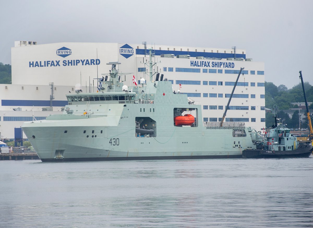 HMCS Harry deWolf heads from the Irving-owned Halifax Shipyard on its way to being delivered to the Royal Canadian Navy dockyard in Halifax on Wednesday, July 31, 2020. THE CANADIAN PRESS/Andrew Vaughan.