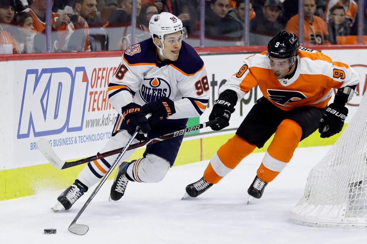 Edmonton Oilers' Jesse Puljujarvi, left, tries to keep the puck away from Philadelphia Flyers' Ivan Provorov during the first period of an NHL hockey game, Saturday, Feb. 2, 2019, in Philadelphia. (AP Photo/Matt Slocum).