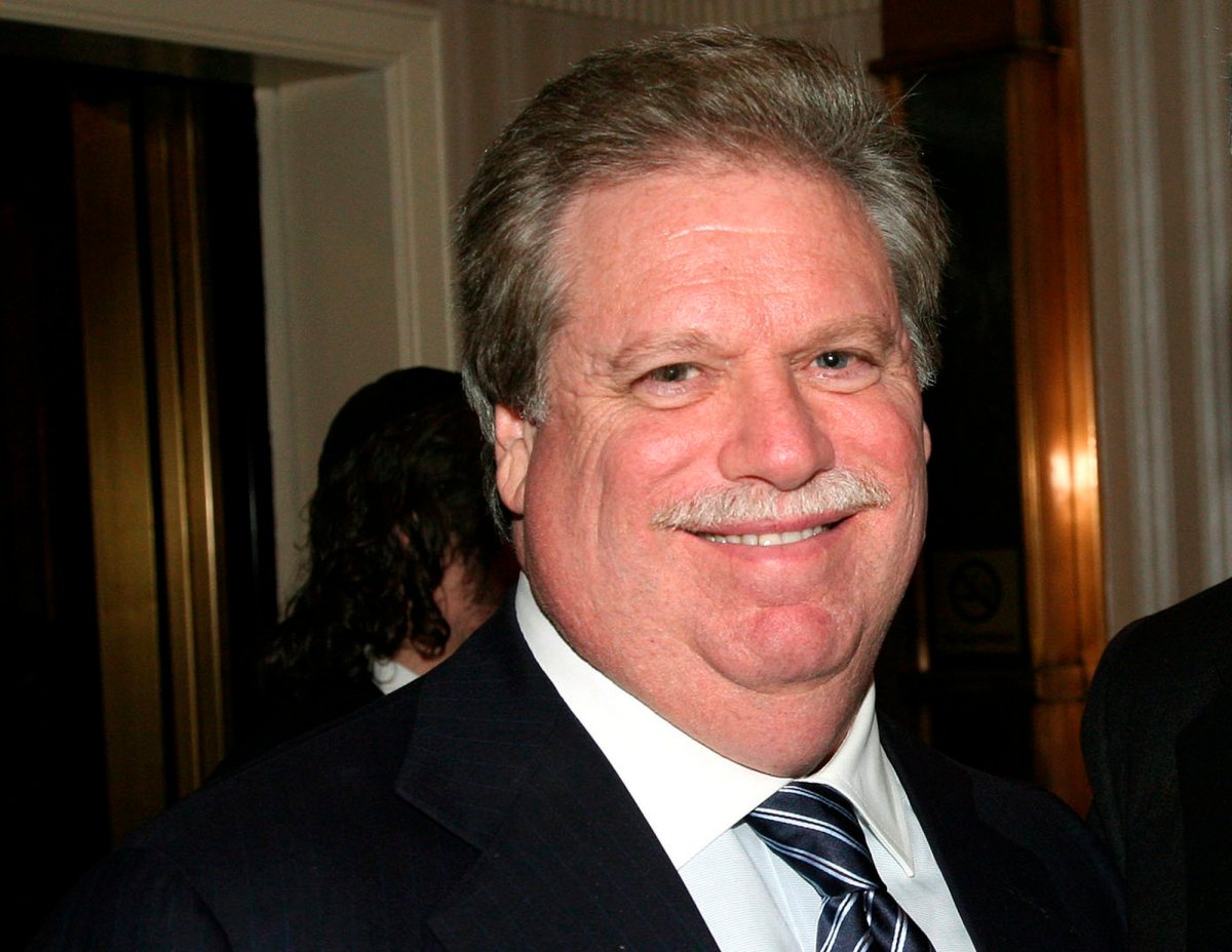 FILE - In this Feb. 27, 2008, file photo, Elliott Broidy poses for a photo at an event in New York. 