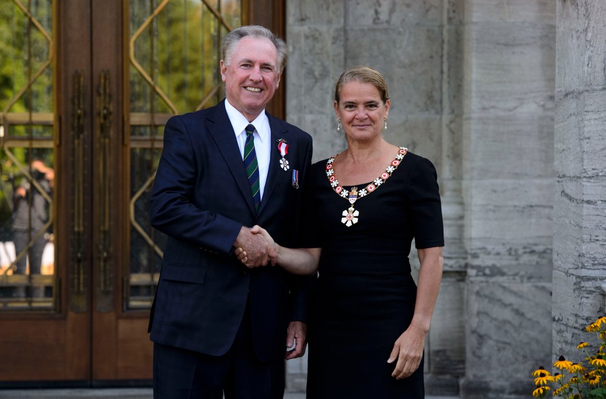 Governor General Julie Payette presents Ron Foxcroft of Hamilton, Ont. with the Order of Canada during a ceremony at Rideau Hall in Ottawa on Thursday, Sept. 5, 2019. Foxcroft invented the Fox 40 whistle. 