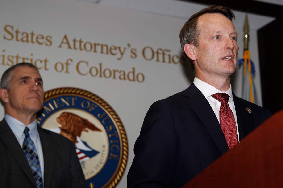 Jason R. Dunn, U.S. Attorney for the District of Colorado, right, makes a point as Dean Phillips, FBI special agent in charge, listens during a news conference in Denver Monday, Nov. 4, 2019, to announce the arrest of a man who repeatedly espoused anti-Semitic views in a plot to bomb a historic Colorado synagogue in Pueblo.