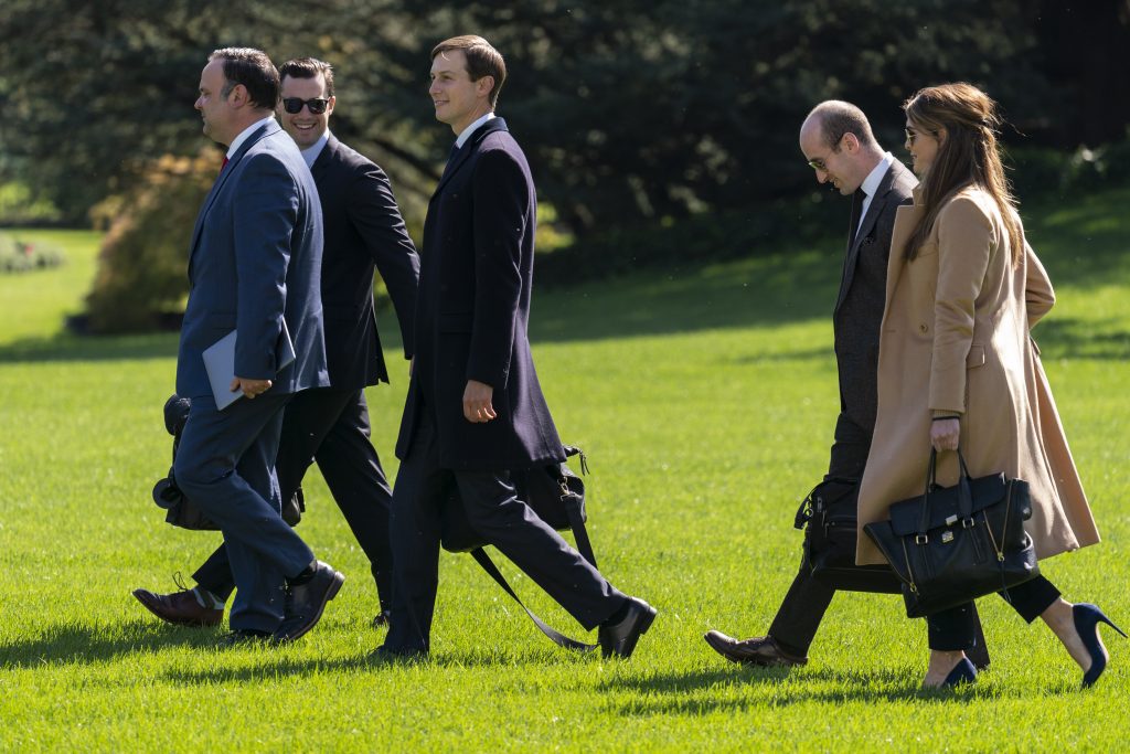 From left, Assistant to the President and Deputy Chief of Staff for Communications Dan Scavino, Assistant to the President and Director of Oval Office Operations Nicholas Luna, Senior Adviser to the President of the United States Jared Kushner, Senior Adviser to the President Stephen Miller, and counselor to President Hope Hicks walk to board Marine One with President Donald Trump at the White House, Wednesday, Sept. 30, 2020, in Washington, for the short trip to Andrews Air Force Base en route to Minnesota.