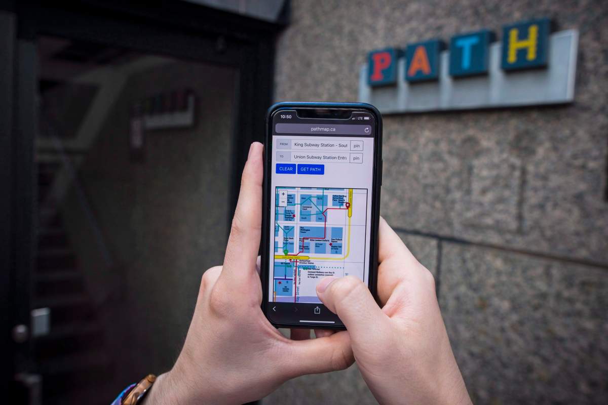 A website which maps out the PATH system is displayed on a cellphone in Toronto on Monday, July 9, 2018.