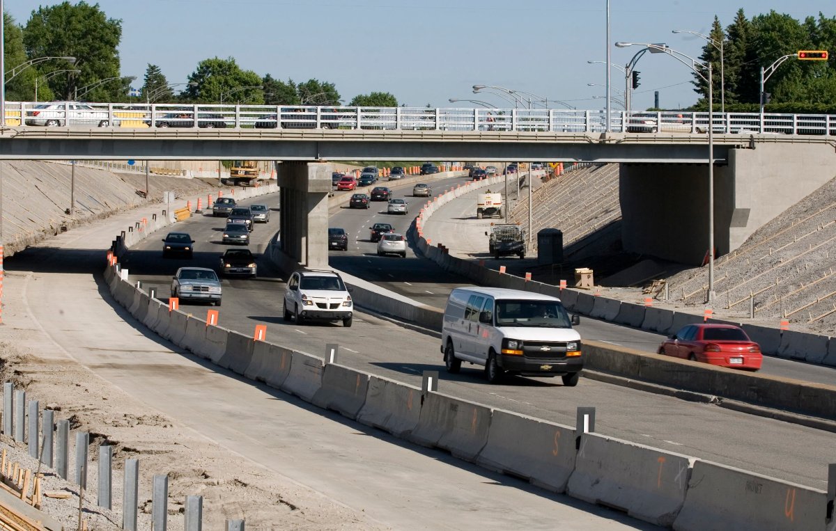 Cars drive underneath the opened Concord overpass on Wednesday, June 13, 2007 in Laval, Quebec. 
