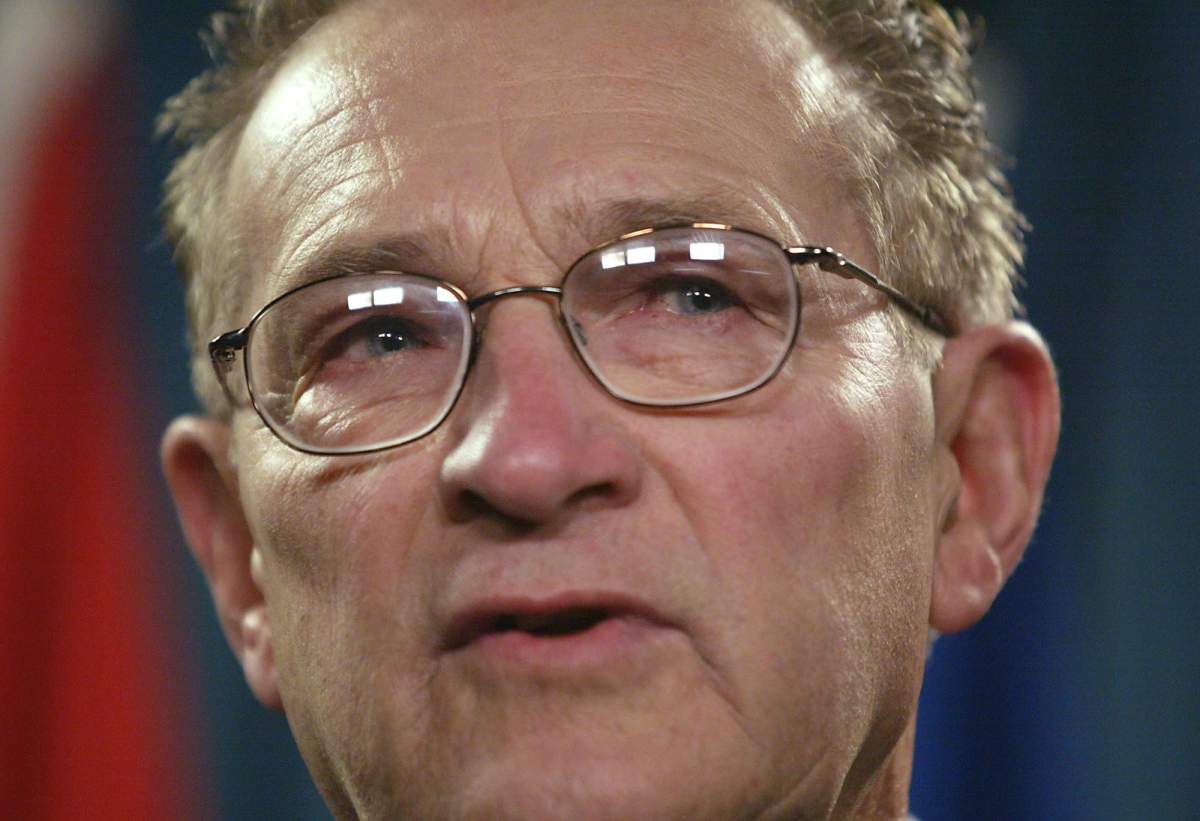 Saskatchewan farmer Percy Schmeiser speaks during a news conference on Parlament Hill in Ottawa Monday, Jan. 19, 2004.  Schmeiser battles a multinational in the Supreme Court of Canada Tuesday. Among the issues at stake are whether a seed can be patented and whether a farmer must pay if that seed falls on his land and grows. Schmeiser says his land was polluted by Monsanto's Roundup Ready canola seed.