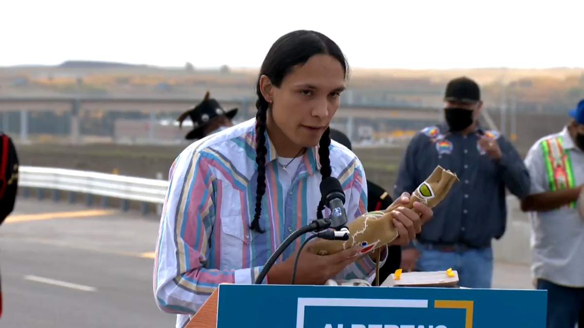 Seth Cardinal Dodginghorse holds a bag containing soil from his former home that his family had to abandon to make way for Tsuut’ina Trail, pictured on Oct. 1, 2020.