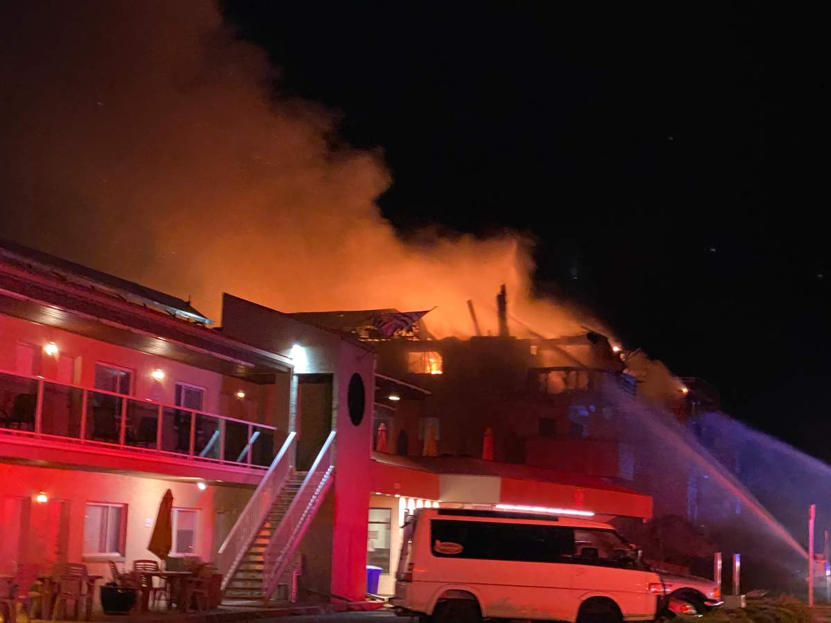 Penticton’s fire chief said wind fanned the flames burning an apartment building early Tuesday morning.