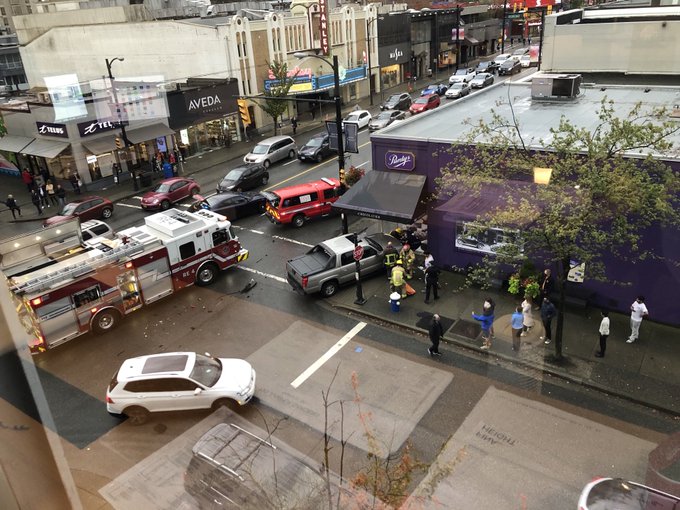 The scene of a collision in Vancouver that sent a pedestrian flying through a glass window on Friday. 