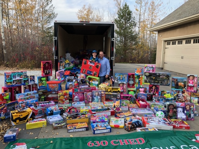 The Kostiw family with the toy donations