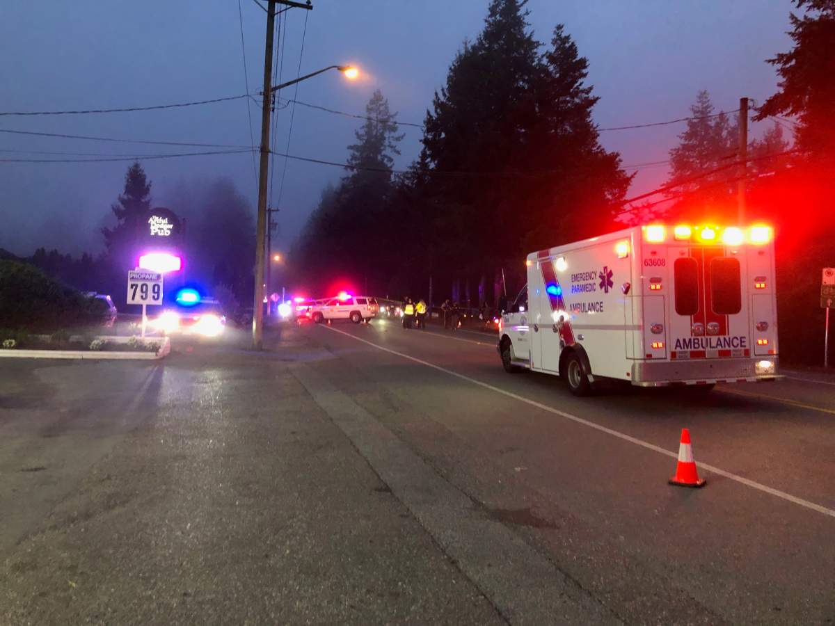 Police and paramedics at the scene of a police-involved shooting in Langley.