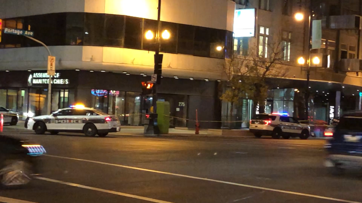 Winnipeg police at the scene of an assault Friday night.