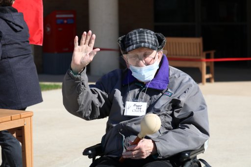 WW2 veteran Charles (Charlie) Jackson waving at birthday drive- by outside Parkwood Institute to mark his 100th birthday in London, Ont. Oct 17, 2020