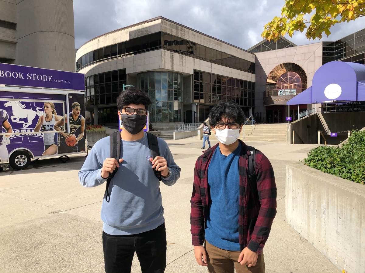 Left to right: T.J. Ayoub and Kishore Basu.