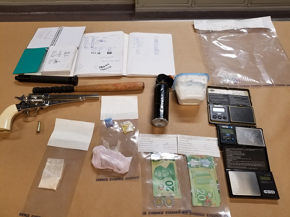 Kelowna RCMP say weapons, drug paraphernalia and suspected stolen property were seized during the drug bust.