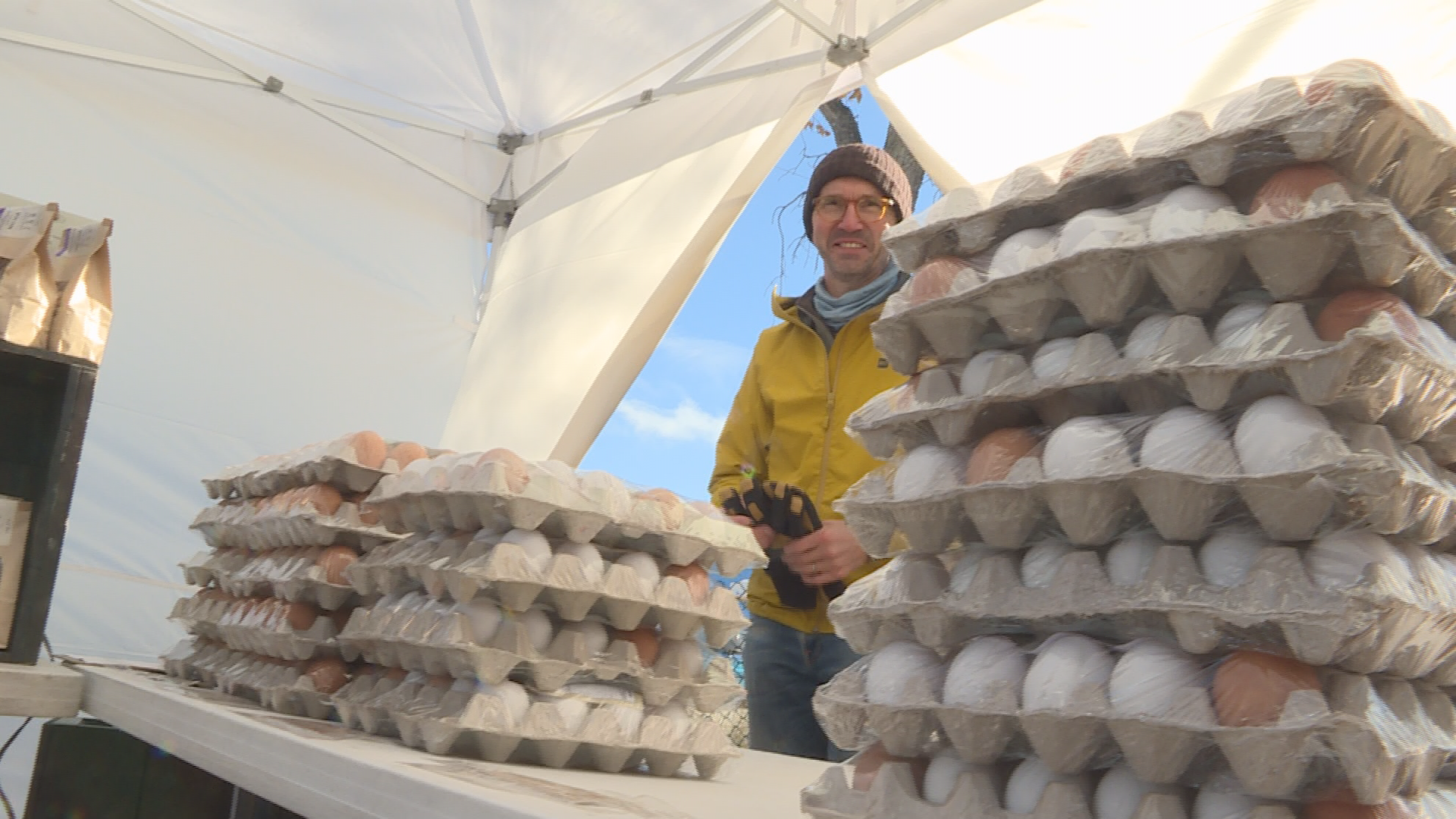 Hermann Grauer, a co-owner of Nature's Farm in Steinbach, standing at his stall during Saturday's edition of the St. Norbert farmers market.