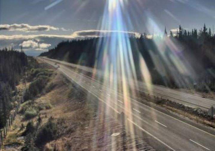 This highway camera image shows sunny conditions at the Pennask Summit on Sunday morning. However, by Sunday evening Environment Canada is expecting snowfall. 