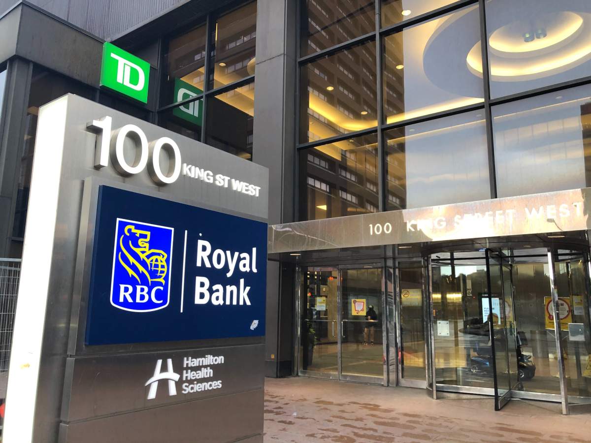 Hamilton police are looking for two suspects who robbed a man at this RBC ATM.