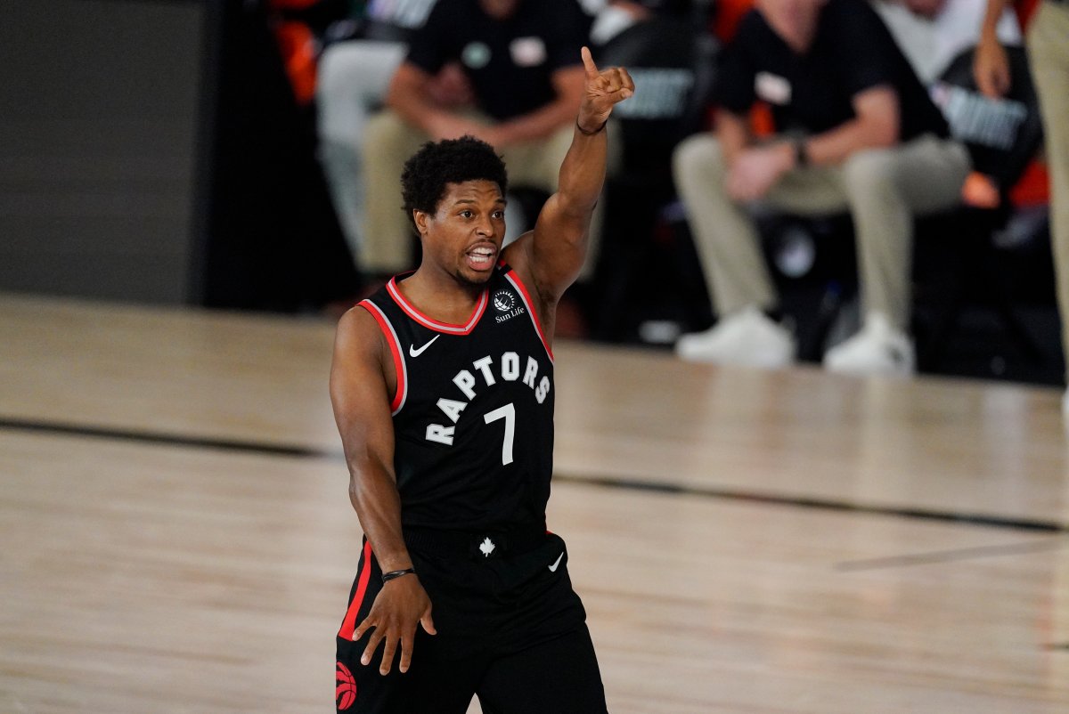 Toronto Raptors' Kyle Lowry (7) reacts during the first half of an NBA conference semifinal playoff basketball game against the Boston Celtics Saturday, Sept. 5, 2020, in Lake Buena Vista, Fla.