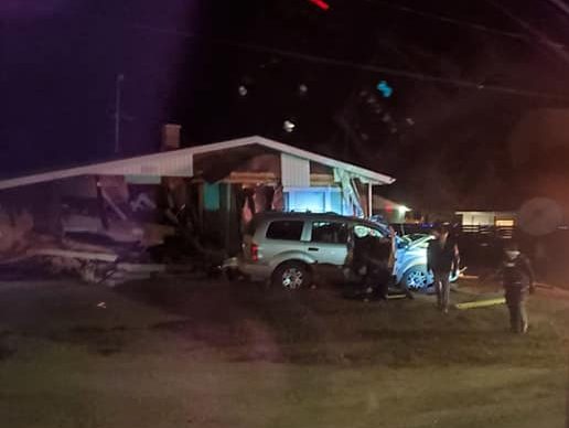 The scene of a multi-vehicle collision involving a home in Sandy Lake, MB on Friday.