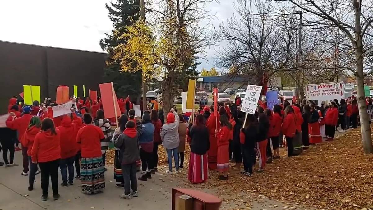 About a hundred people formed a circle at the High Level court house on Oct. 5, a scheduled court date for the man accused of killing Roderica Ribbonleg.