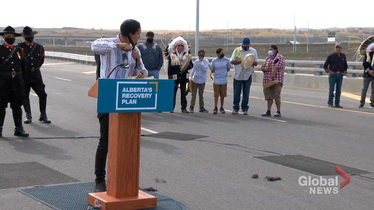 Seth Cardinal Dodginghorse cuts off his braids in protest of the opening of Tsuut’ina Trail, the southwest portion of Calgary’s ring road, pictured on Oct. 1, 2020.