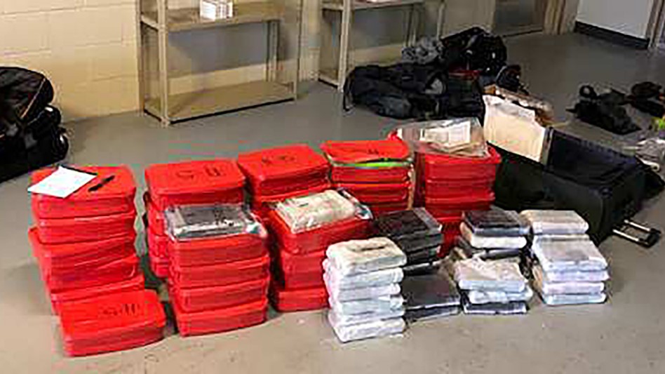 A photo from U.S. Customs and Border Patrol showing bags of cocaine and methamphetamine that were seized on Friday, Oct. 23.