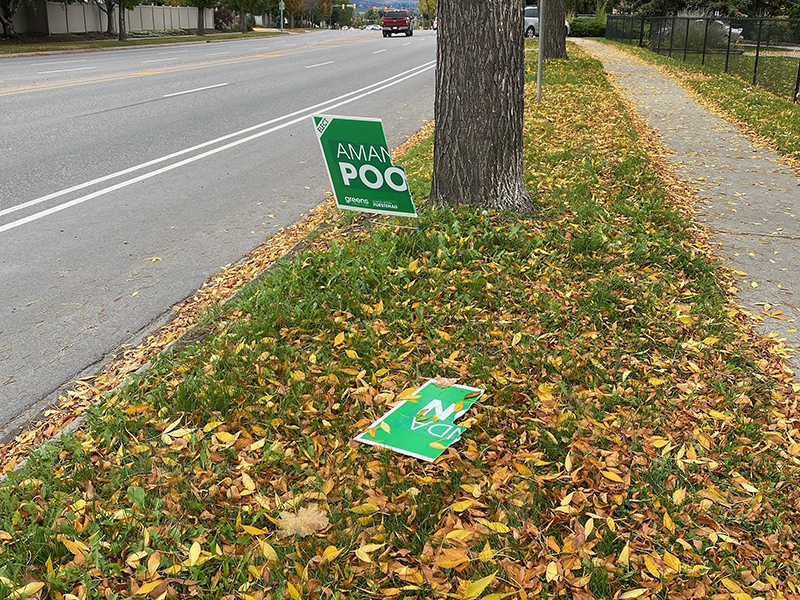 A destroyed campaign sign for Green Party candidate Amanda Poon.