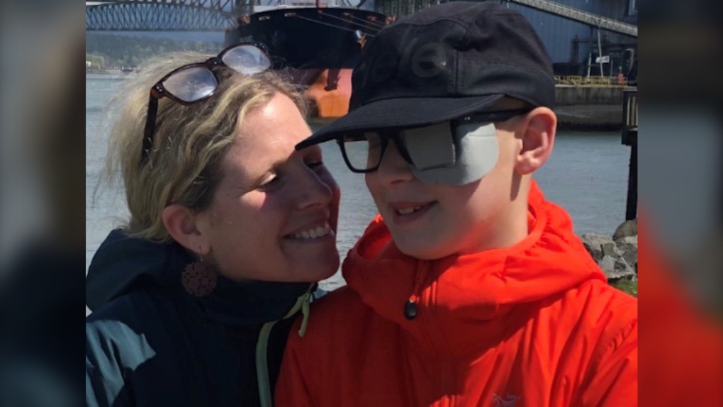 Kimberly Berger poses for a photo with her son, Jonah, 12, in this undated handout photo. Berger and her son travelled to Seattle, Wash., last February where he underwent proton beam therapy for a brain tumour at a private clinic. 