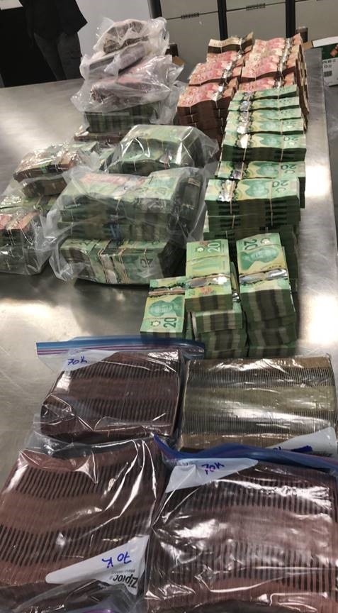 Calgary police seized methamphetamine, cocaine, fentanyl, MDMA and more than $4 million cash after a seven-month-long drug trafficking investigation that led to homes and vehicles being searched on Oct. 5, 2020.