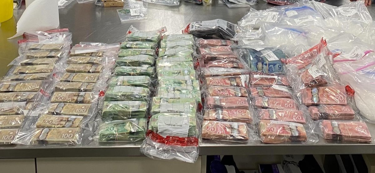 Calgary police seized methamphetamine, cocaine, fentanyl, MDMA and more than $4 million cash after a seven-month long drug trafficking investigation that led to homes and vehicles being searched on Oct. 5, 2020.