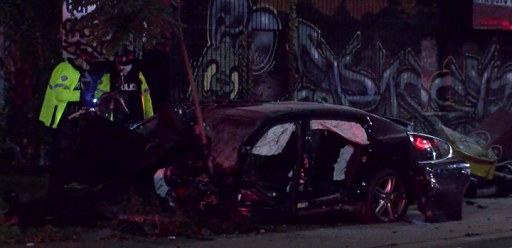 Photo of police on scene after a crash near Lansdowne Avenue and College Street in Toronto.