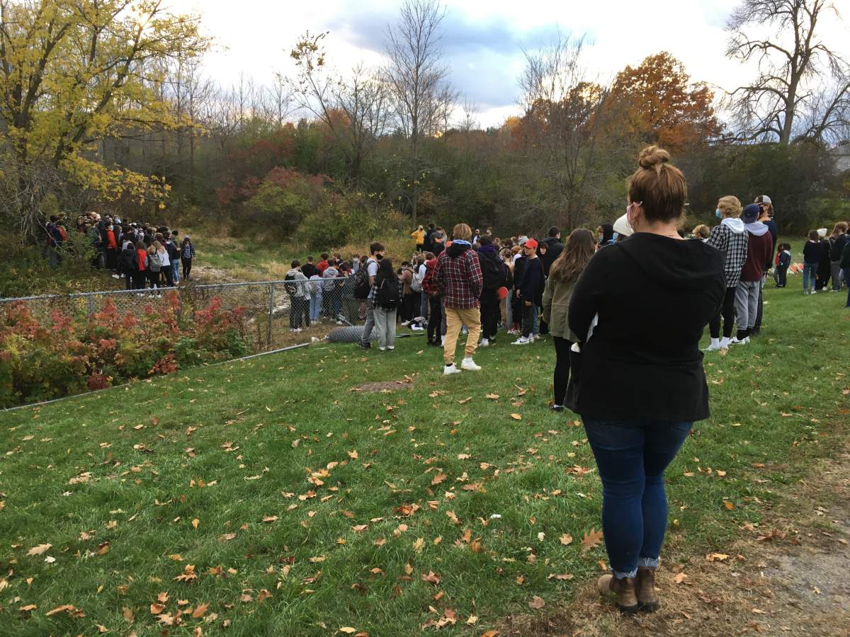 Students gathered at the site of a crash that took the life of 16 year old Scott Legg, a Grade 11 student at Frontenac Secondary School, to remember a young life cut short.