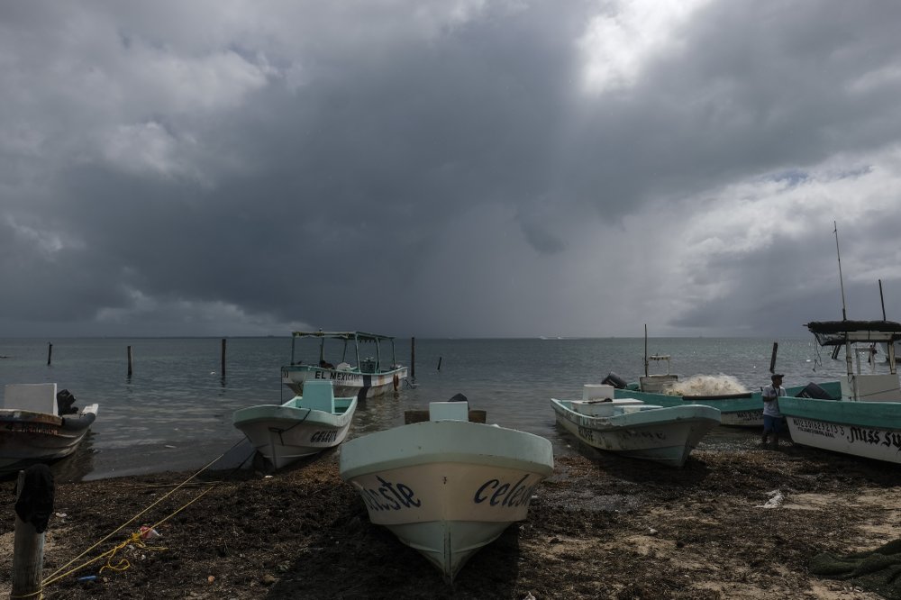 Boats sit closer to the shore after they were secured by fishermen preparing for the arrival of Hurricane Delta in Puerto Juarez, Cancun, Mexico, Tuesday, Oct. 6, 2020..