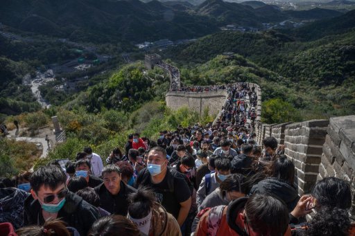 Chinese tourists line up at a bottleneck as they climb a section of the Great Wall at Badaling after tickets sold out during the ‘Golden Week’ holiday on Oct. 4, 2020 in Beijing, China.