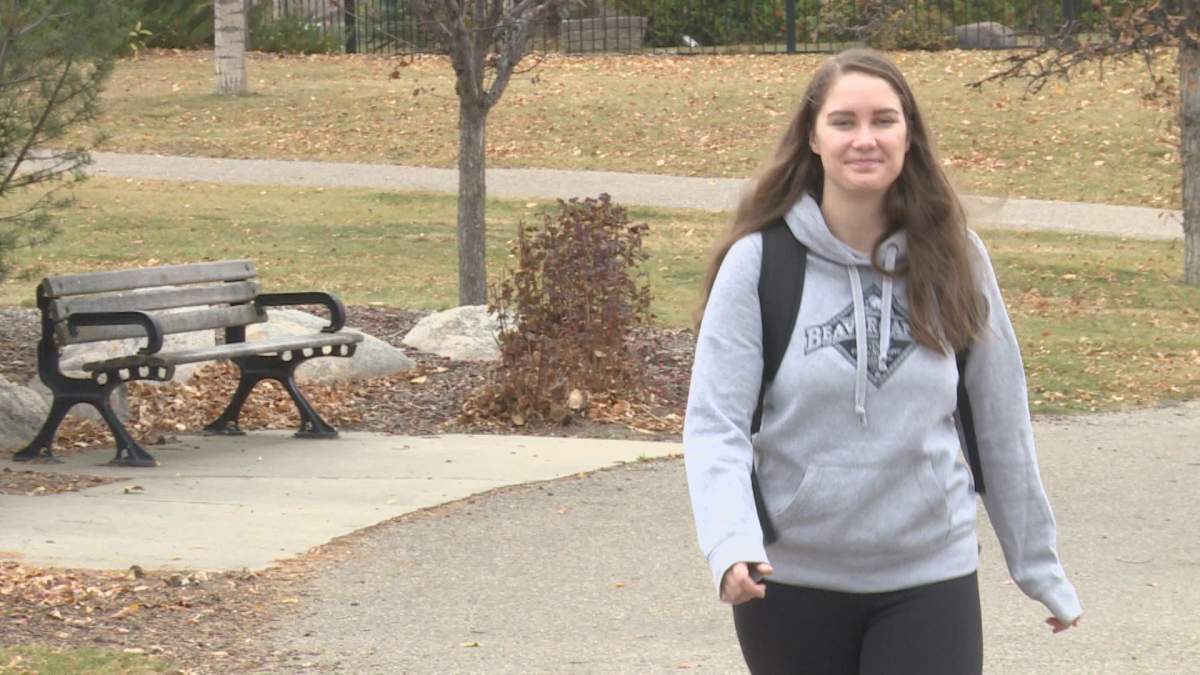 Kaelee Steele, 24, walks around Chinook Lake to begin her 24-hour-long trek across the city to fundraise for the homeless.