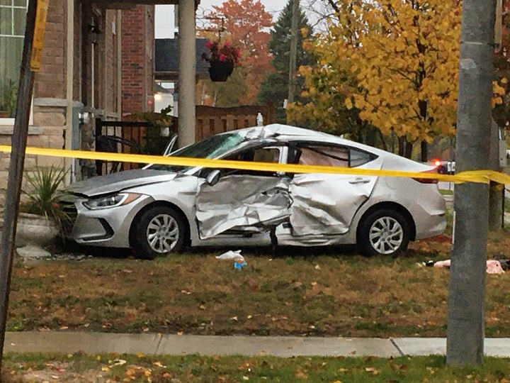 A photo of the car following a collision near Asterfield Drive and Lawrence Avenue East.