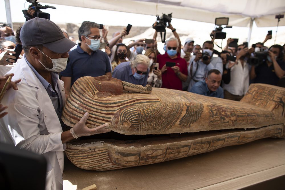 mummy with gold sarcophagus