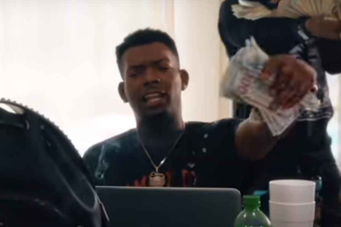 A scene is shown from the rap video 'EDD' on YouTube.